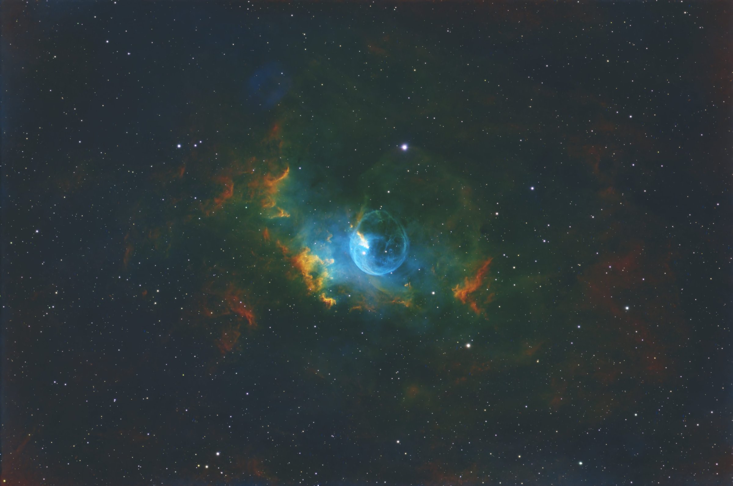 NGC 7635, commonly known as the Bubble Nebula and cataloged as Sh 2-162 and Caldwell 11, is an emission nebula in Cassiopeia. The prominent bubble is shaped by the stellar wind from the massive hot star SAO 20575, which pushes into the surrounding molecular cloud and ionized hydrogen region. The object lies near the open cluster Messier 52 and is generally placed at roughly 7,000 to 11,000 light years from Earth, depending on the distance estimate used for the surrounding complex. | Equipment: Celestron HD8, ZWO ASI6200MMP, Antlia Pro 3nm SHO, 4h 25m integration, 10/15/2025