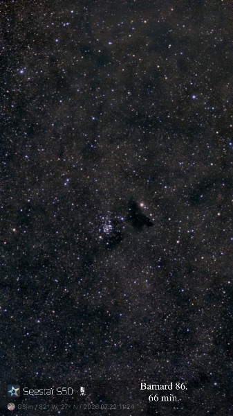 One of E. E. Barnard’s dark nebulae, B 86 looks like a void in space, seen in front of the billowing star clouds near the galactic center in Sagittarius. | Equipment: Seestar S50 in alt-az mode.